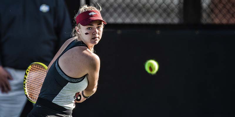Women's tennis action shot photo