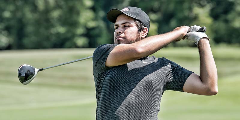 Men's golf tee shot photo